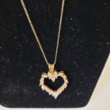 14KT YELLOW GOLD AND DIAMOND HEART PENDANT ON 14KT YELLOW GOLD CHAIN