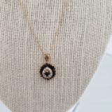 14KT GOLD, SAPPHIRE AND DIAMOND PENDANT ON A 14KT GOLD CHAIN