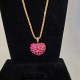 14KT GOLD AND RUBY PENDANT AND CHAIN:
