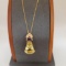 14KT GOLD, CITRINE AND AMETHYST PENDANT ON A 14KT GOLD CHAIN