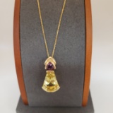 14KT GOLD, CITRINE AND AMETHYST PENDANT ON A 14KT GOLD CHAIN