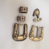 2 STERLING SILVER AND GOLD BELT BUCKLE SETS: