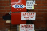 4 ENAMEL OIL SIGNS: (1) DX, (3) TEXACO DANGER SIGNS