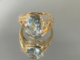 10K GOLD AND PALE BLUE TOURMALINE RING,