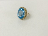 14KT YELLOW GOLD AND TOPAZ RING,