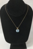 14KT GOLD AND TOPAZ PENDANT  ON A 18KT GOLD CHAIN