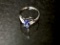 10KT WHITE GOLD AND TANZANITE RING,