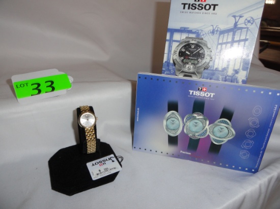 LADIES' TISSOT GOLD TONE WATCH, NEW WITH PAPERS