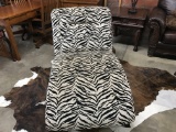 BLACK & WHITE UPHOLSTERED CHAISE LOUNGE IN A ZEBRA PATTERN