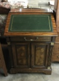 MAHOGANY DAVENPORT DESK WITH A LEATHER COVERED LIFT TOP