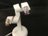 14KT GOLD AND TANZANITE EARRINGS, EACH WITH 8 TRILLION CUT STONES