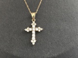 14KT GOLD AND CZ CROSS PENDANT ON A 10KT GOLD CHAIN