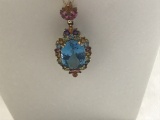 14kt GOLD, TOPAZ AND AMETHYST PENDANT ON 10KT GOLD CHAIN