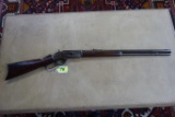 WINCHESTER FIRST MODEL 1873 LEVER ACTION RIFLE WITH RAISED THUMBPRINT DUST COVER, SR # 29141,