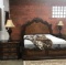 KING SIZE BEDROOM SUITE: ORNATE HEADBOARD & FOOTBOARD, MATCHING SIDE TABLES & LAMPS