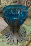 BLUE GLASS VASE ON IRON BASE