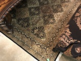 PERSIAN STYLE RUG WITH BLACK AND GOLD GROUND 8' 11