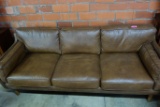 MODERN STYLED BROWN LEATHER SOFA BY WOODWORTH.