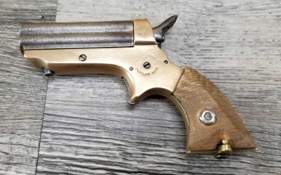 C. SHARPS MODEL DERRINGER