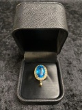 BLUE OVAL TOPAZ AND DIAMOND PENDANT
