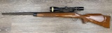 REMINGTON MODEL 700 .243 WIN CALIBER BOLT-ACTION RIFLE W/SCOPE.