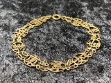 CHINESE GOOD LUCK BRACELET IN 14K YELLOW GOLD