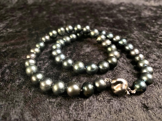ONE STRAND OF BEAUTIFUL BLACK PEARLS