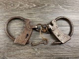 PAIR OF ANTIQUE IRON HANDCUFFS W/KEY COCHISE COUNTY ARIZONA