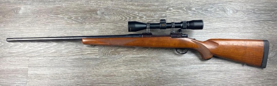RUGER M77 RIFLE IN 7MM REM. MAG/24" BBL w/ SCOPE