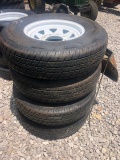 (4) 235/80-16 tires on 8 hole rims