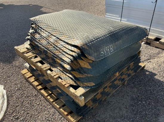 STACK OF RUBBER FLOOR MATS