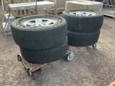Four Jeep Wheels & Tires W/ Cart