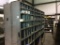 CONTENTS OF MIDDLE SHELF *BOTH SIDES* IN CAGED ROOM (SHELF IS NOT INCLUDED, MISC. PARTS, TOOLS,