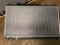 UNUSED RADIATOR (NOT SURE WHAT IT FITS)