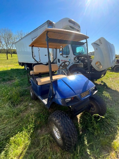 EZGO GAS GOLF CART (LIFTED, FLIP BACK SEAT, DATE