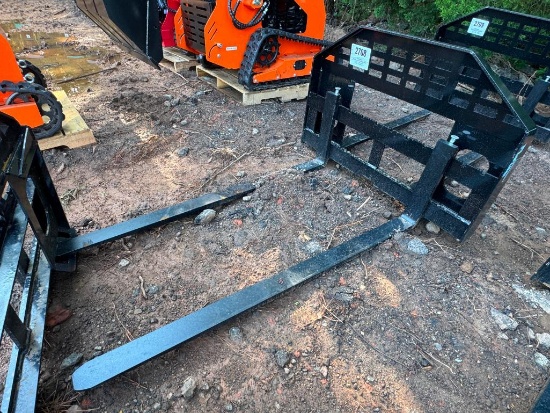 UNUSED FUTURE SKID STEER FORK ATTACHMENT