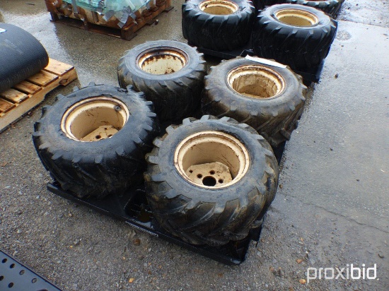 Four Used Trencher Tires & Wheels