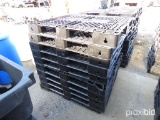 One Stack of Plastic Pallets