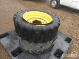 Two Used 8-Lug Wheels and 10-16.5 Tires