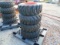 Quantity of Four Bobcat Wheels and Tires