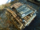 Pallet of Bolt-On Rubber Pads for an Excavator