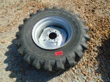 One Titan 15x19.5 NHS Tractor Tire and 6-Lug Wheel