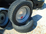 Two Titan LSW 305-521 NHS Tires and 6-Lug Wheels