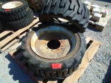 Two Miscellaneous Forklift Tires and Wheels