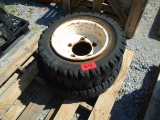 Two Miscellaneous Forklift Tires and Wheels