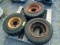 Three Miscellenaeous Forklift Tires and Wheels