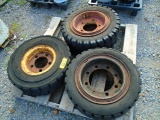 Three Miscellenaeous Forklift Tires and Wheels