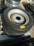 Two Titan LSW 305-521 NHS Tires and 6-Lug Wheels
