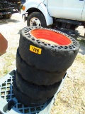 Four Solid Skid Steer Tires and Wheels