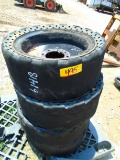 Four Solid Skid Steer Tires and Wheels